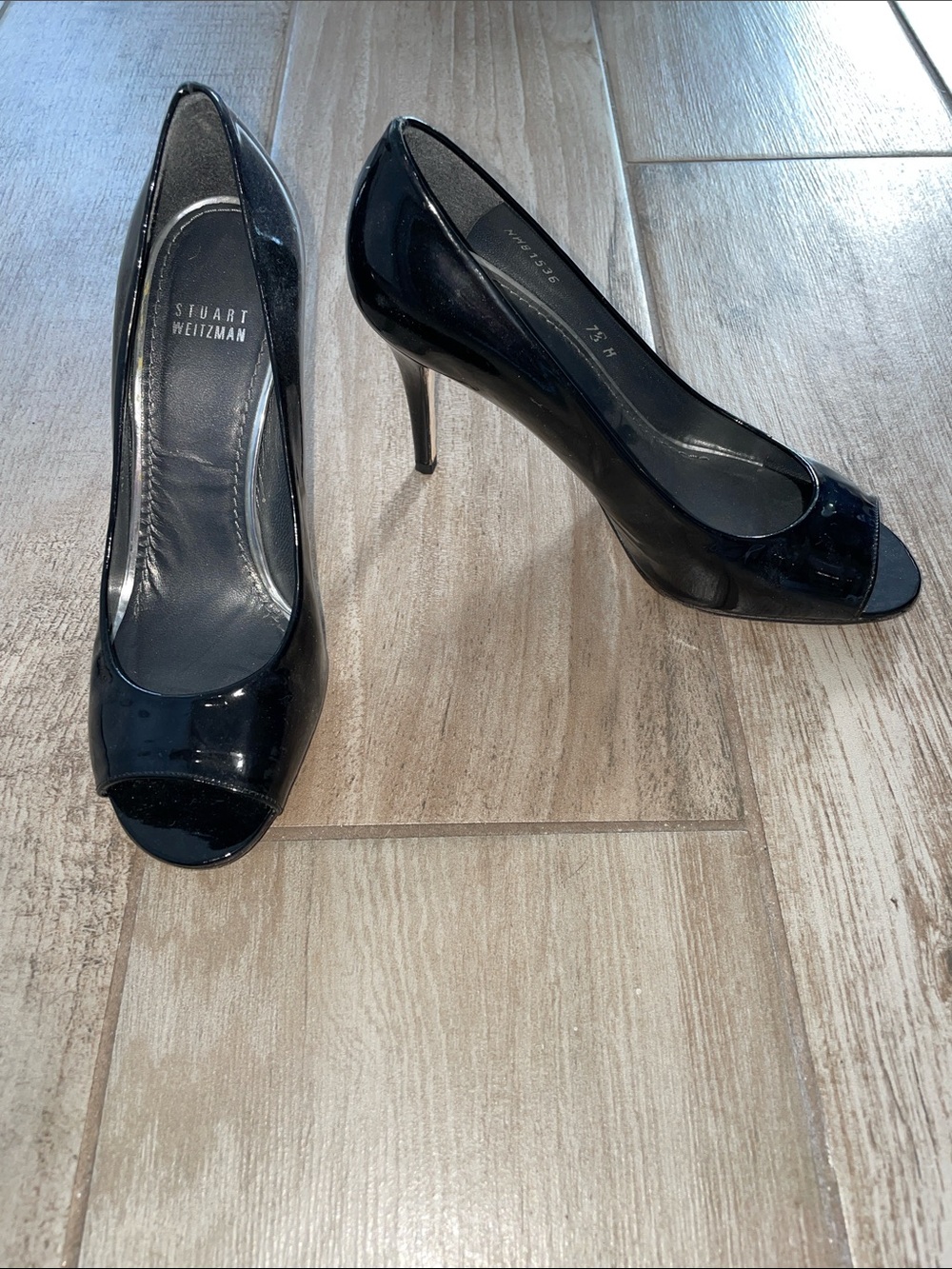 Stuart Weitzman black patent peep toe heels, size 7.5